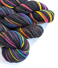 Load image into Gallery viewer, Supernova on superwash merino/nylon sock yarn.
