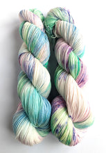 Load image into Gallery viewer, Sky Blue Pink on a superwash Merino/nylon sock yarn.
