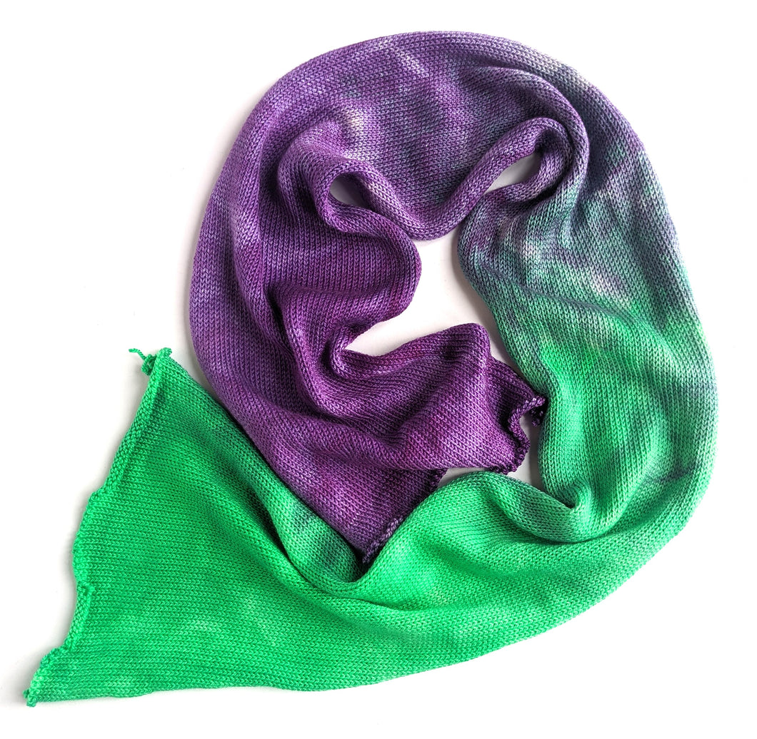 Superwash merino/silk 4ply blank, in green and purple.