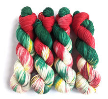 Load image into Gallery viewer, Jingle Bells on superwash merino/nylon/sparkle sock yarn.
