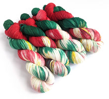 Load image into Gallery viewer, Jingle Bells on superwash merino/nylon/sparkle sock yarn.
