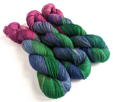 Load image into Gallery viewer, Glow of the Bauble, on superwash merino/yak/nylon sock yarn.
