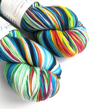 Load image into Gallery viewer, Geeks&#39; Aurora on superwash merino/nylon sock yarn.
