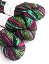 Load image into Gallery viewer, Pretty Pink Polly, on superwash merino/nylon sock yarn.
