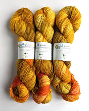 Load image into Gallery viewer, Smaug, on superwash merino/nylon sock yarn.
