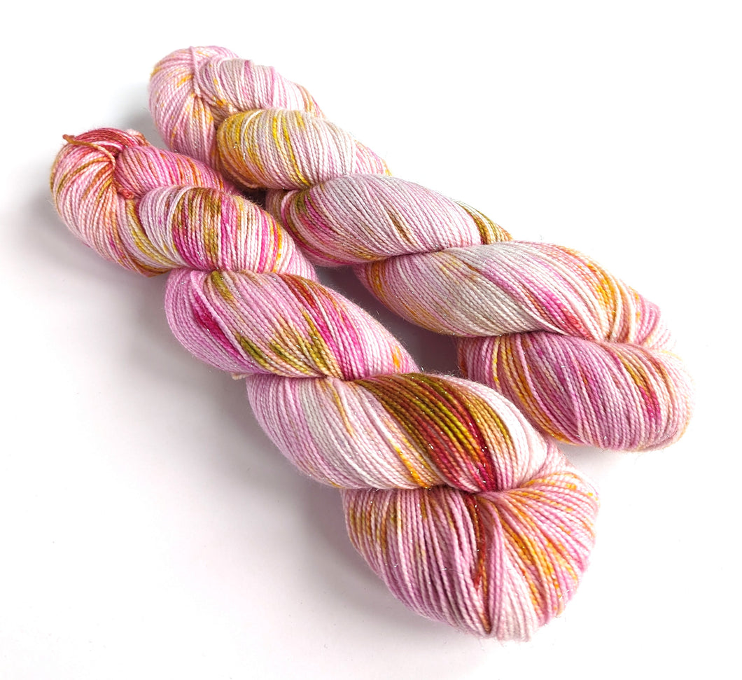 Aster, on a superwash Merino/nylon/sparkle sock yarn.