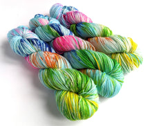 Load image into Gallery viewer, Festival on superwash Merino/nylon/sparkle sock yarn.
