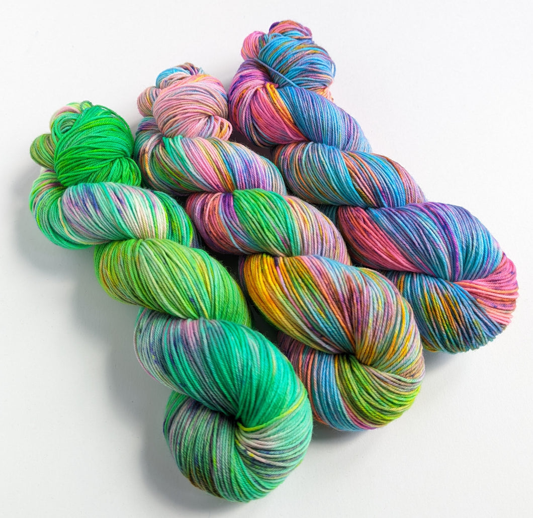 Green, pink, blue gradient yarn set, on superwash merino/nylon sock yarn.