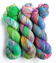 Load image into Gallery viewer, Green, pink, blue gradient yarn set, on superwash merino/nylon sock yarn.
