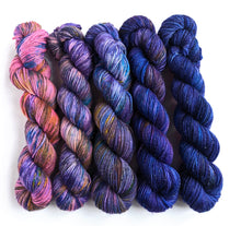 Load image into Gallery viewer, Pink-purple gradient yarn set on a superwash merino/nylon/sparkle sock yarn.
