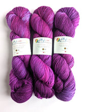 Load image into Gallery viewer, Purples on superwash Merino/nylon/sparkle sock yarn.
