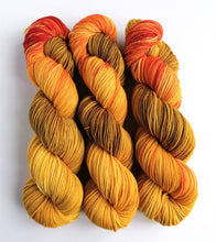 Load image into Gallery viewer, Smaug, hand dyed on Superwash Merino crazy 8 DK. freeshipping - Felt Fusion
