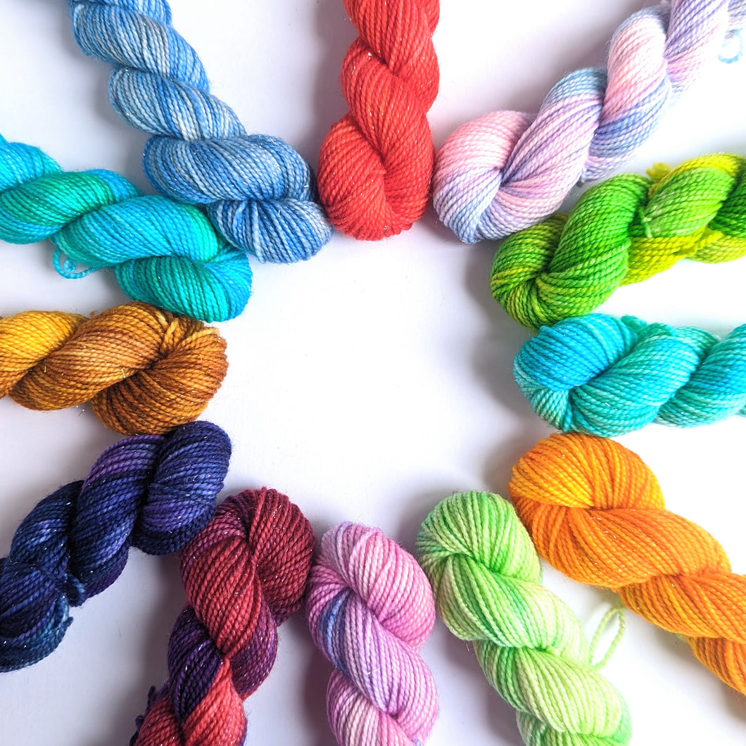 Zodiac hand dyed mini skeins. 12 x 20g sock, sparkle sock, and DK minis.